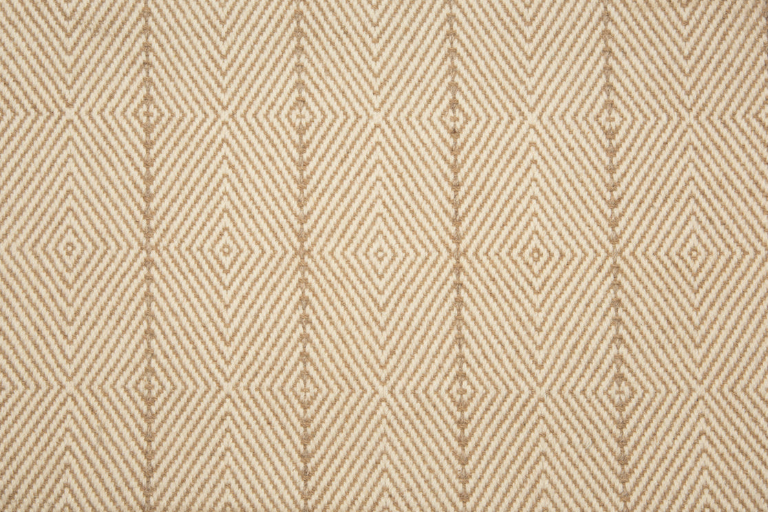 Broadloom carpet with diamond weave in cream and tan with widely spaced pin stripe in tan.