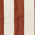 Fabric in a wide stripe pattern in rust and cream.