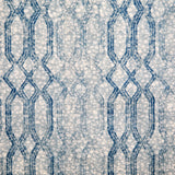 Printed fabric with monochomatic geometric stripe and mottled textural background in shades of blue. 