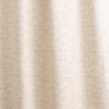 Draped fabric yardage in a textural geometric print in shades of cream on a white field.