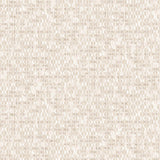 Detail of fabric in a textural geometric print in shades of cream on a white field.