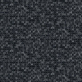 Detail of fabric in a textural geometric print in shades of gray on a charcoal field.