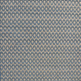 Handwoven wool with textural oval pattern in blue on a beige field. 