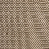 Handwoven wool rug with textural oval pattern in taupe on a beige field. 