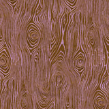 Detail of fabric in a textural wood grain print in purple on a brown field.