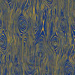 Detail of wallpaper in a textural wood grain print in yellow on a blue field.