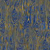 Detail of wallpaper in a textural wood grain print in yellow on a blue field.