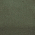 Detail of velvet fabric yardage in dark green.