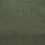 Detail of velvet fabric yardage in dark green.