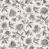Watercolor floral pattern with black leaves and flowers on a cream background