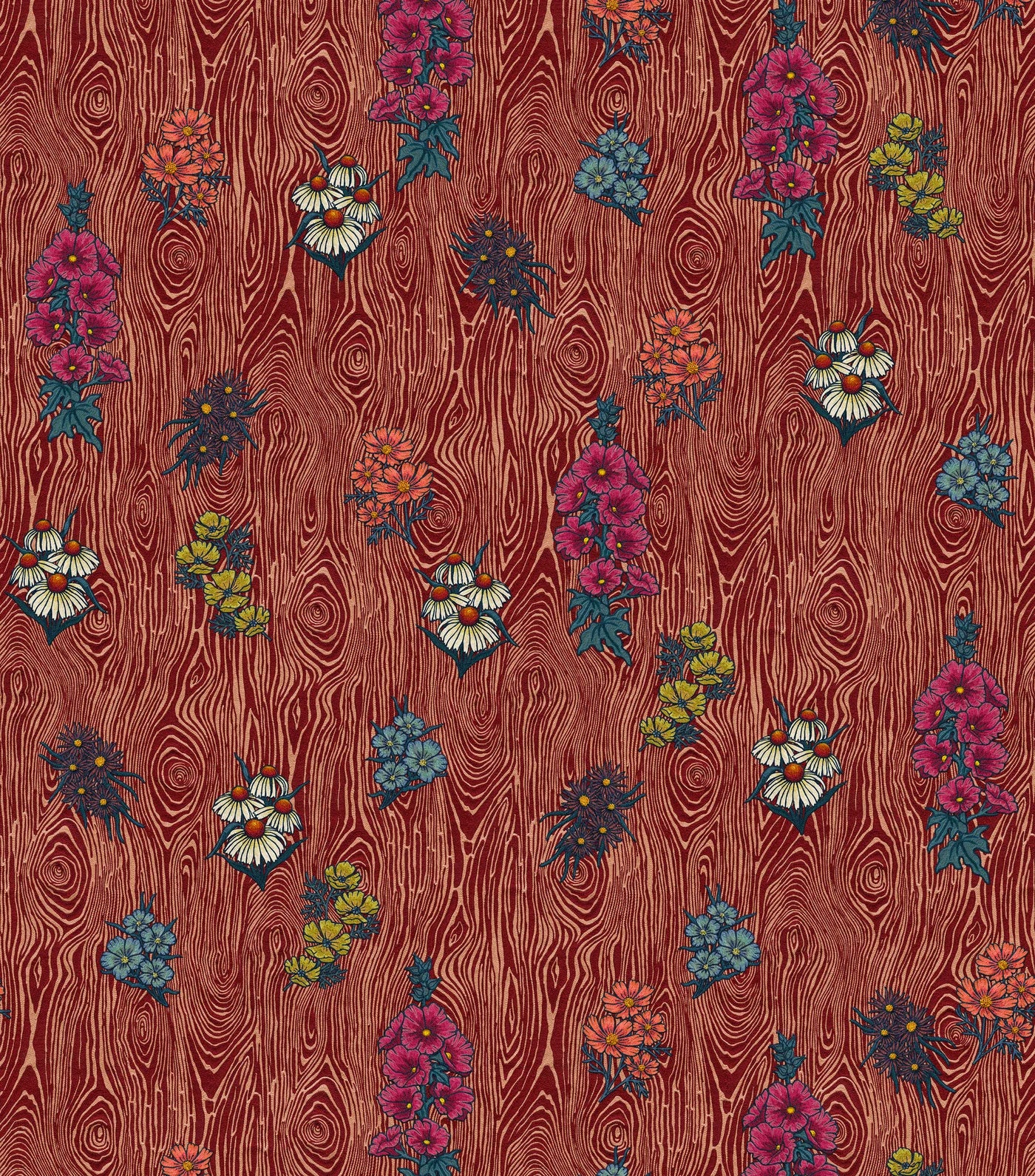 Detail of wallpaper in a varied floral print on a wood-grain field in shades of red, pink, yellow and green.