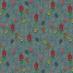Scaled-out view of wallpaper in a varied floral print on a wood-grain field in shades of blue, red, yellow and green.