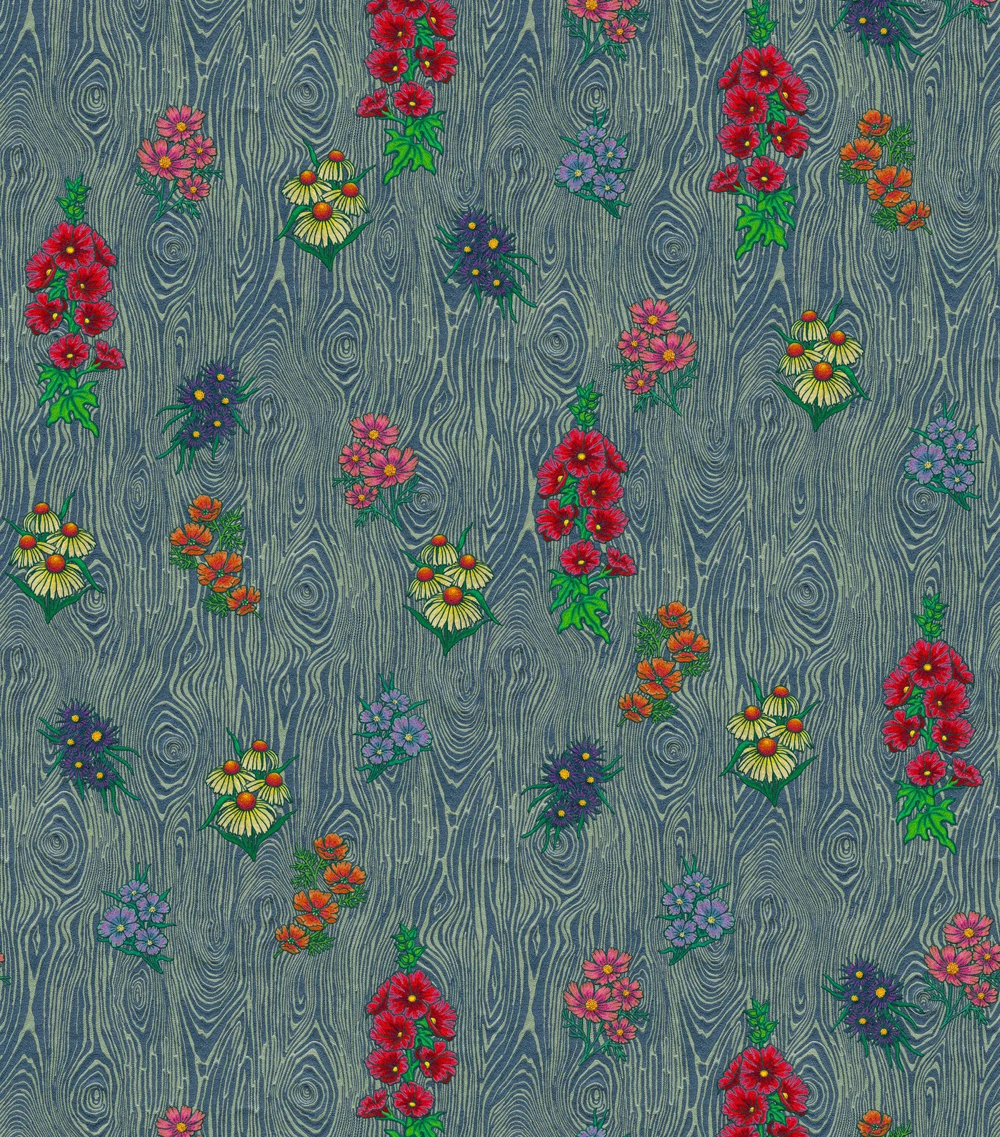 Detail of wallpaper in a varied floral print on a wood-grain field in shades of blue, red, yellow and green.