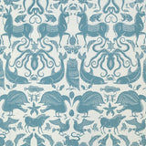Patterned fabric with animals and sea creatures in light blue on a white background
