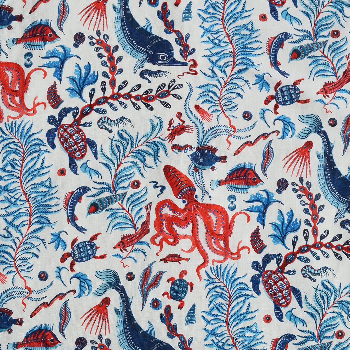 Nautical-themed fabric pattern with red, blue, and navy sea creatures on a white background.