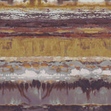 Detail of fabric in an abstract paint swatch print in shades of mauve, pink and yellow.