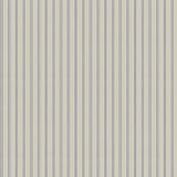Mixed width striped wallpaper in beige, white and navy blue.