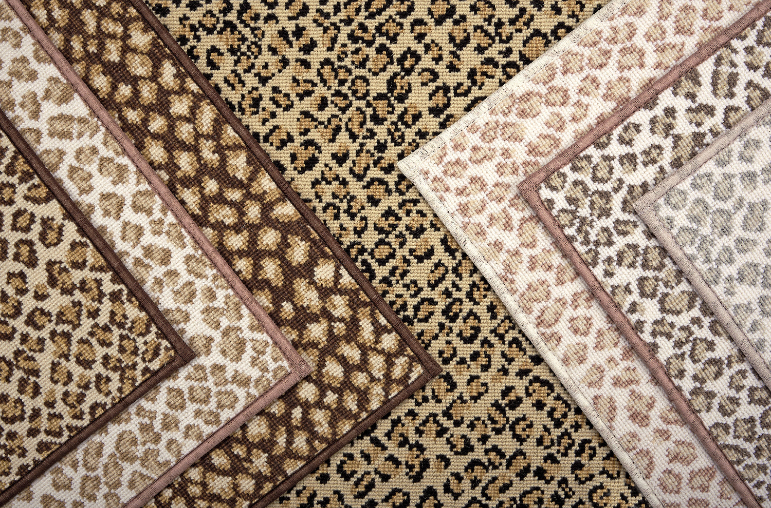 Broadloom carpet with subtle animal print in a range of neutral colors. 