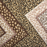 A close-up of a leopard print broadloom carpets in a range of neutral colors