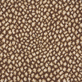 A close-up of a leopard print broadloom in brown and cream spots on a brown background.