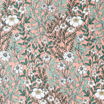 Detail of wallpaper in a dense floral print in white, tan and green on a pink field.