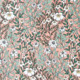 Detail of wallpaper in a dense floral print in white, tan and green on a pink field.