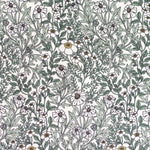Detail of fabric in a dense floral print in white, tan and green on a white field.