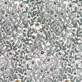 Detail of fabric in a dense floral print in white, tan and green on a white field.