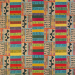 Detail of fabric in a playful geometric grid print in black, tan and multicolor.