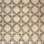 Patterned rug with geometric design on a beige background