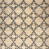 Patterned rug with geometric design on a beige background