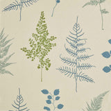 Close-up of fabric in a repeating leaf print in blue and green on a tan field.