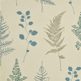 Close-up of fabric in a repeating leaf print in blue, green and tan on a cream field.