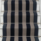 Striped flatweave runner in dark blue and grey on white staircase