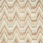 Detail of fabric in a dense chevron stripe print in shades of brown, green and cream.