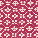 Detail of fabric in a repeating floral lattice print in white and coral on a magenta field.