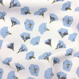 Floral pattern with blue flowers on a white background