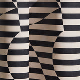 Wallpaper in a trompe l'oeil stripe pattern with geometric shapes in cream and black.