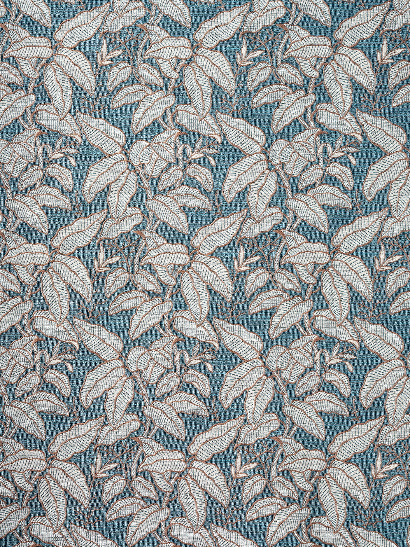 A close-up of a woven fabric pattern featuring a dense botanical leaf design in muted blue, beige, and gray tones.