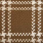 Broadloom carpet in a windowpane plaid in cream on a caramel brown field.