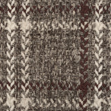Broadloom carpet in a windowpane plaid in brown and cream on heather brown field.