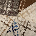 Stack of windowpane plaid broadloom samples in array of handsome colors.