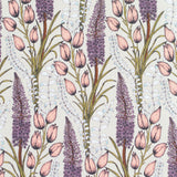 Detail of fabric in a dense foxtail and lilly print in pink, purple, green and white on a cream field.