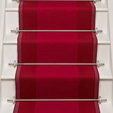 Striped flatweave runner in red on white staircase