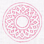 Detail of fabric in a repeating circular geometric print in fuchsia on a white field.