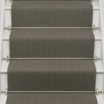 Striped flatweave runner in dark grey on white staircase