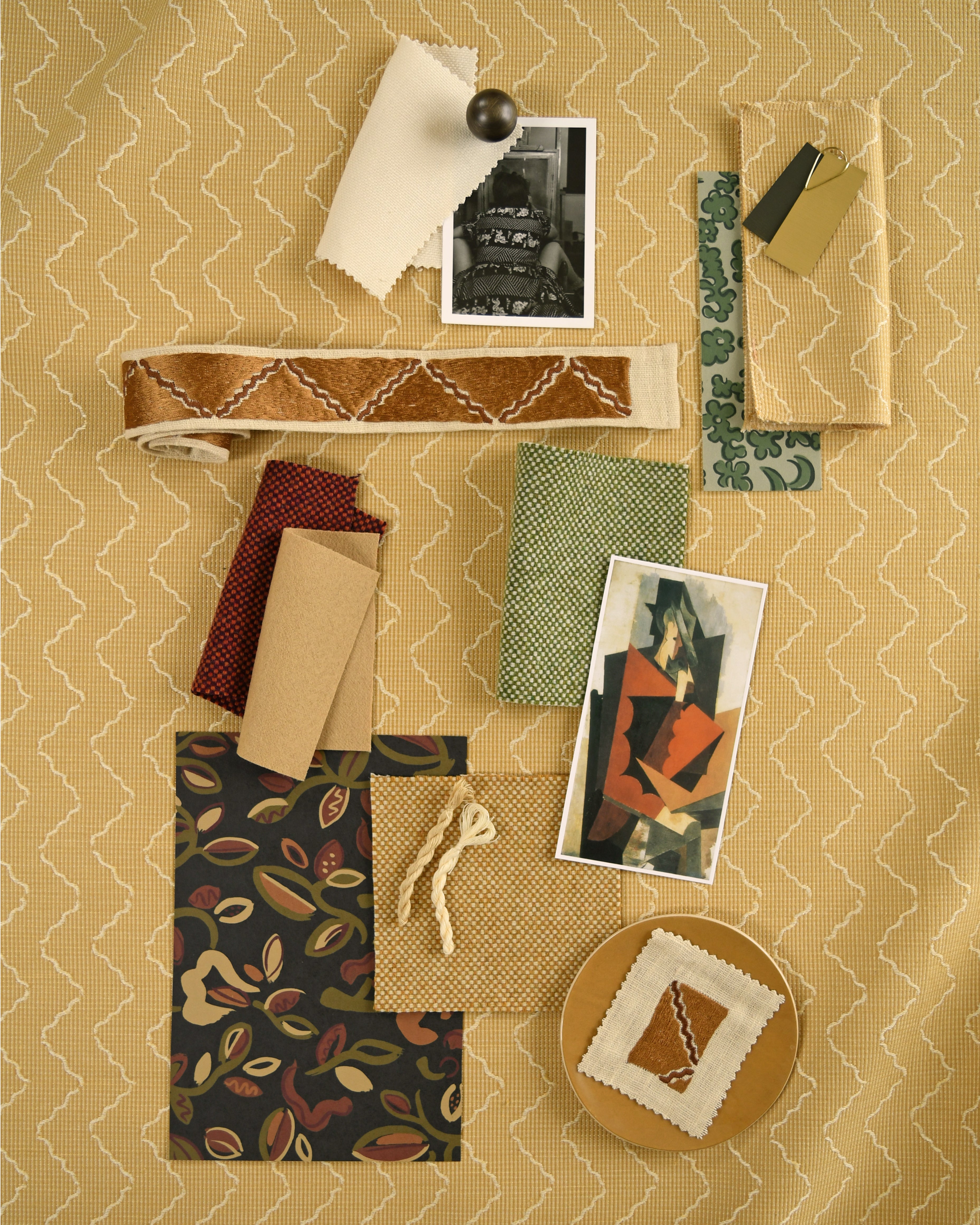 Moodboard with layered swatches of fabrics and inspiration images in palette of yellow, green and brown. 