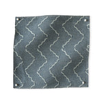 Pinned swatch of woven fabric with chevron stripe in slate blue. 
