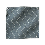 Pinned swatch of woven fabric with chevron stripe in slate blue. 