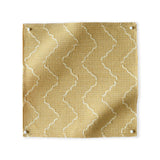 Pinned swatch of woven fabric with chevron stripe in yellow
